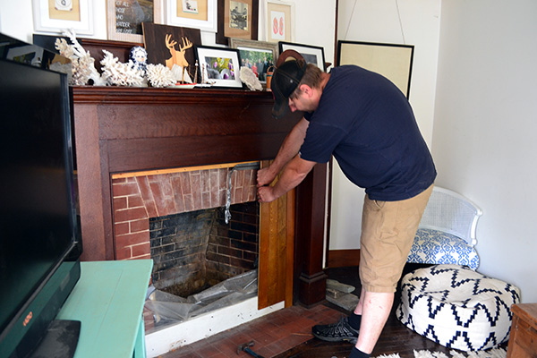 Un-Boarding Up The Living Room Fireplace