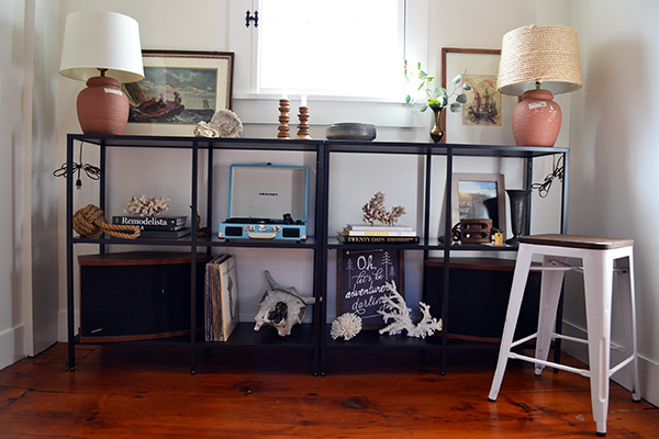 Metal Ikea Vittsjo shelves on a staircase landing