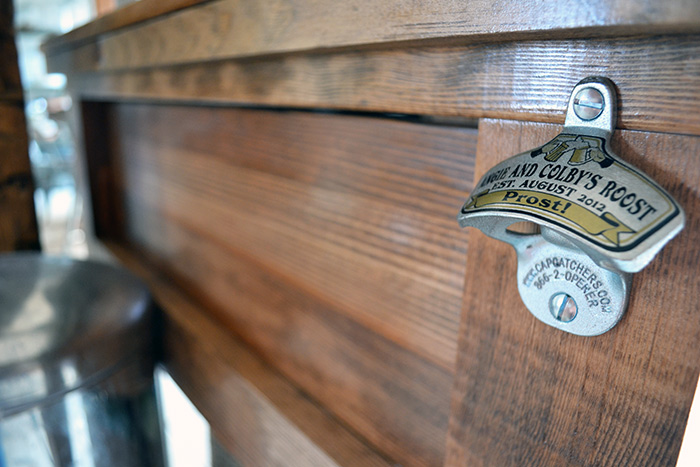 Beer Bottle Opener On A Rustic Kitchen Island