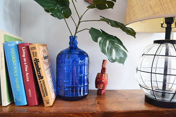 Blue Glass Vase And Palm Leaves