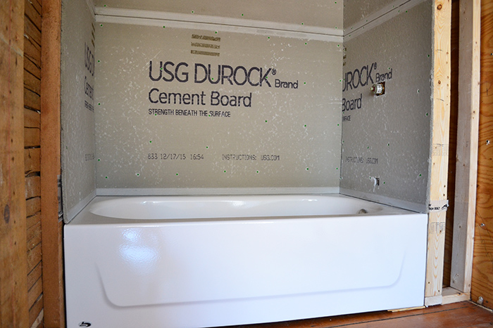 Installed 4.5 ft tub and durock ready to tile tub surround