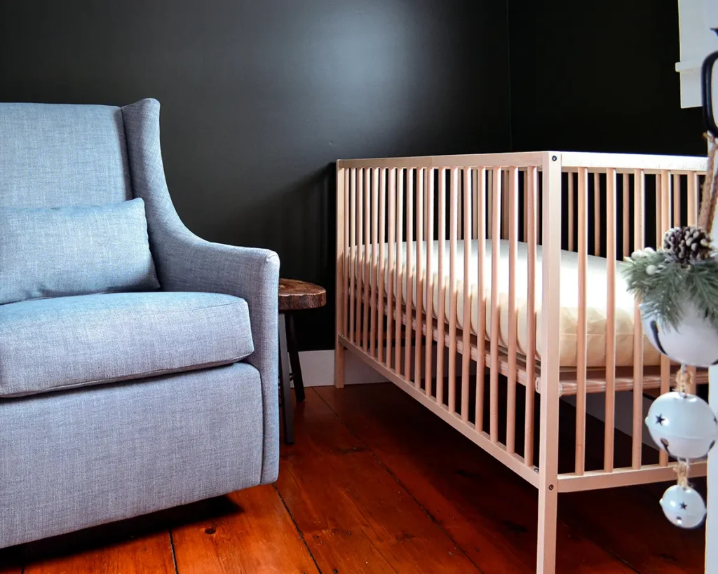 Nursery floor plan with a West Elm Graham glider tucked beside an Ikea crib