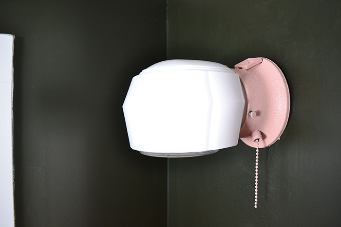 An inexpensive light fixture spray painted pink