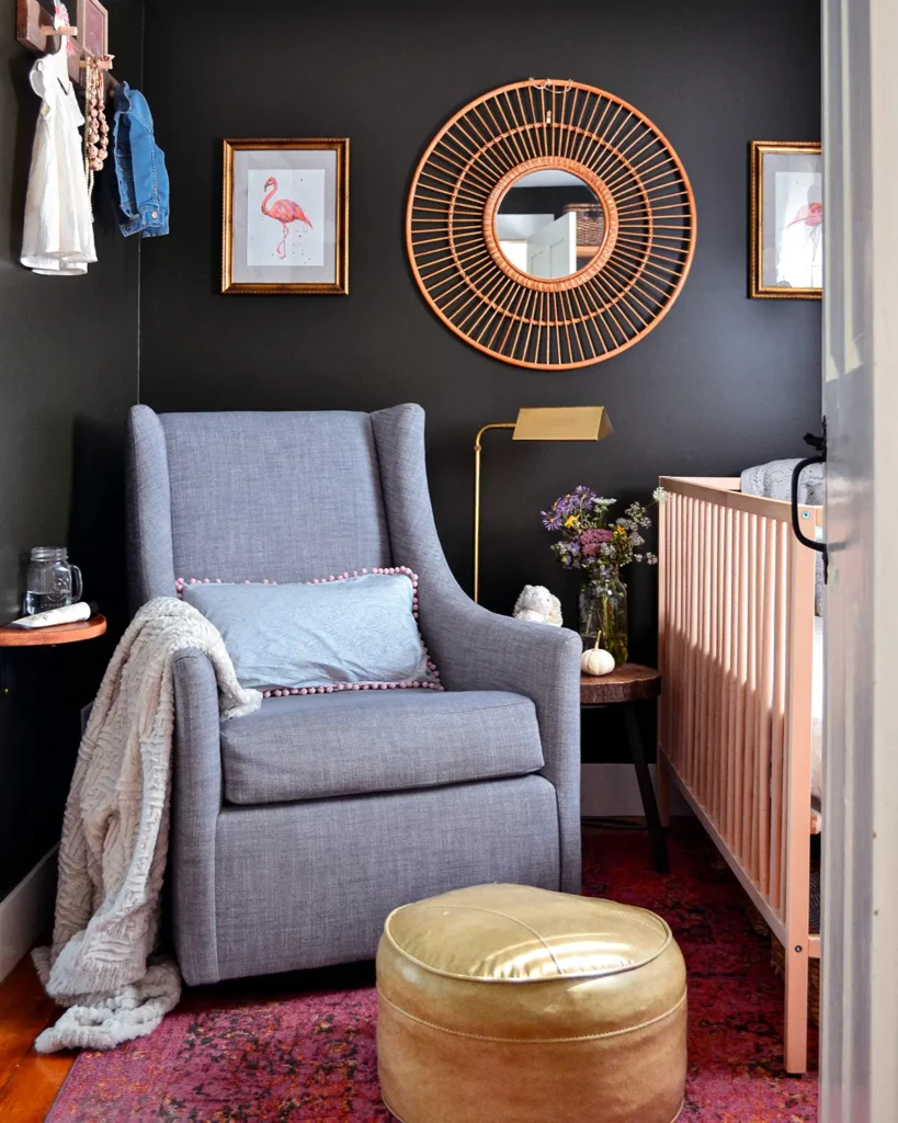 Dark green nursery ideas for styling include adding whimsical art prints to the walls