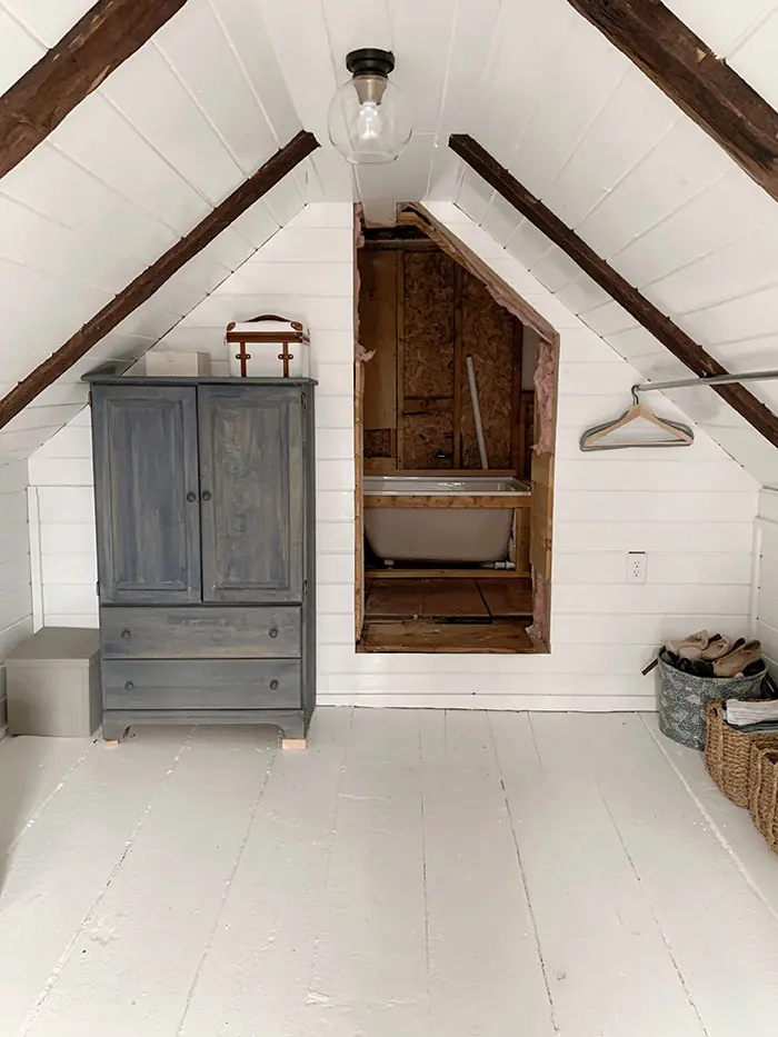 Attic walk-in closet accessed from bathroom