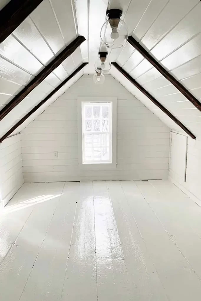 Finished an unfinished attic space, built knee walls, and installed v-groove pine planks between the beams. How much does it cost to finish an attic?