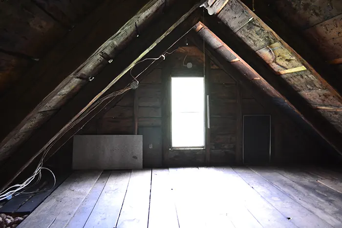 The unfinished little attic in our 1700s Vermont farmhouse, above the keeping room,