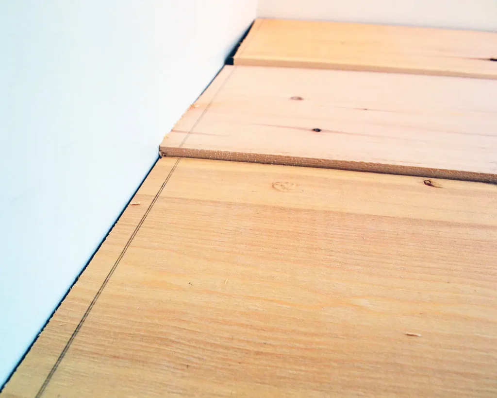 Marking framing lumber with a chalk line to cut a straight counter top with a circular saw