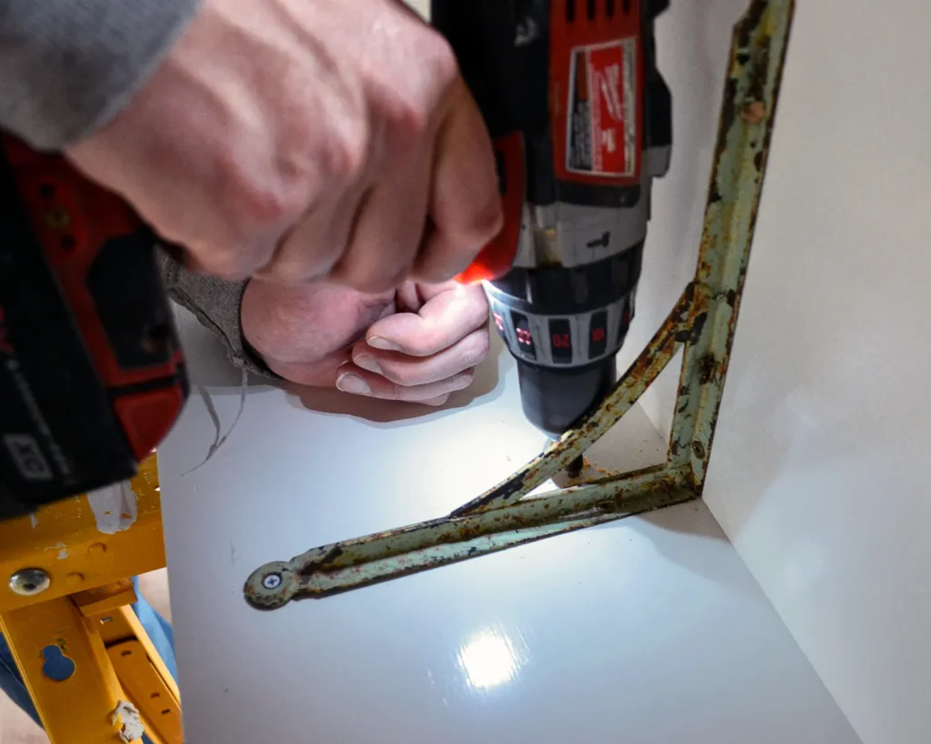 Screwing vintage shelf brackets to pine boards using 3/4" screws to build shelves