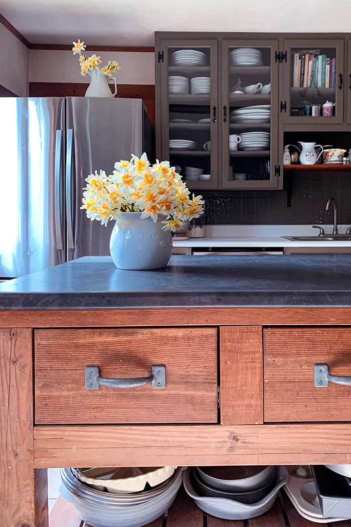 40 Greatest Moments blog post featured image with wood kitchen island