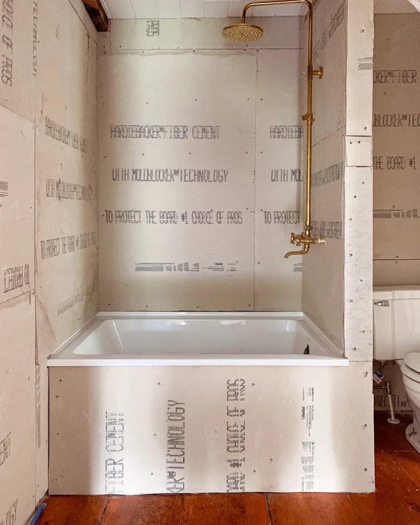 Building a shower surround, installing cement board, and prepping shower for tiling