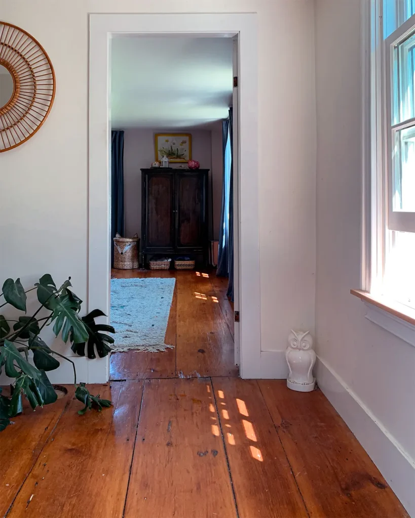 View from the hallway into a little girl's pink bedroom