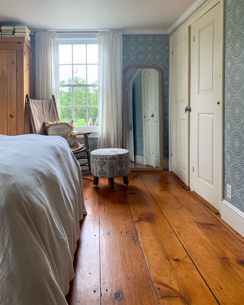 Basic bedroom design layout with vintage rocker in front of South facing window perfect for adding plants