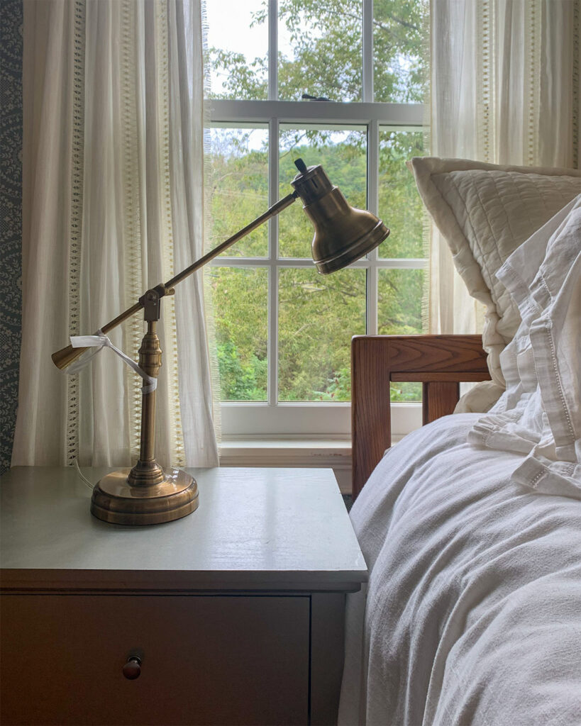 Broken bedside table lamp fixed with Christmas ribbon