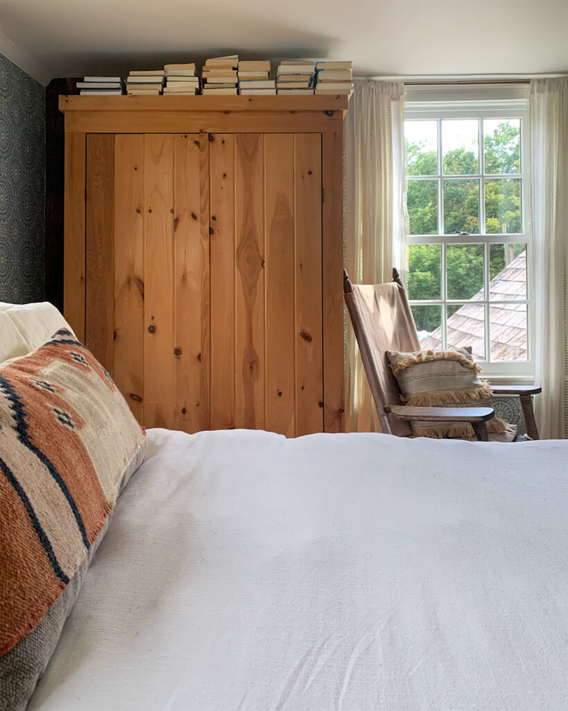 Unfinished pine wardrobe  in our bedroom before starting to give it a refresh