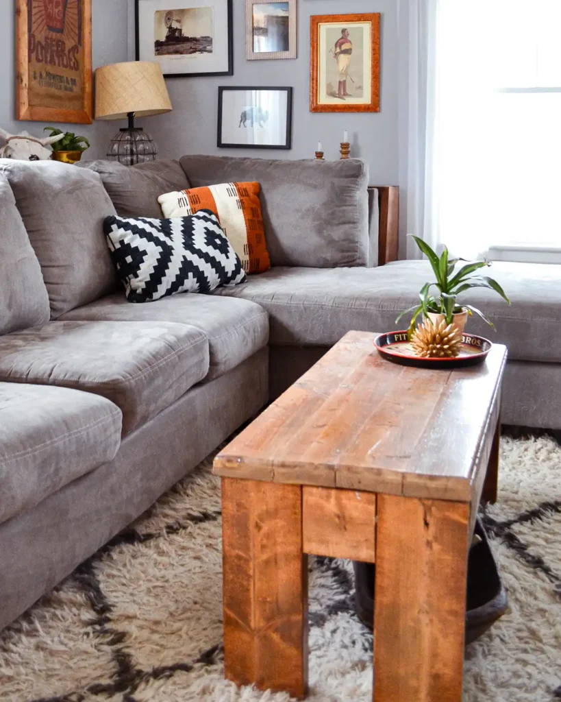 Wood stain finish on a rustic wood coffee table built from repurposed carrying beams