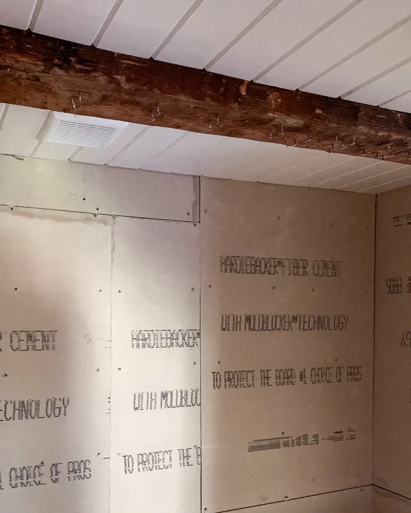 Bathroom finish work phase installing the shiplap ceiling, cement board on walls