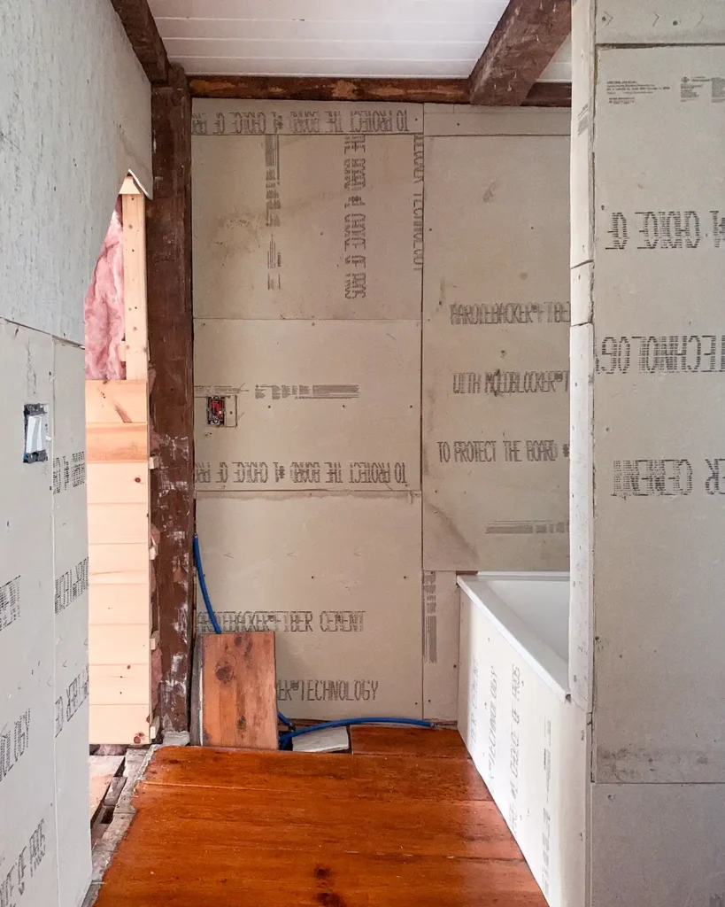 Primary bathroom renovation timeline and the current stage of the makeover with cement board hung and the bathroom getting prepped for tiling