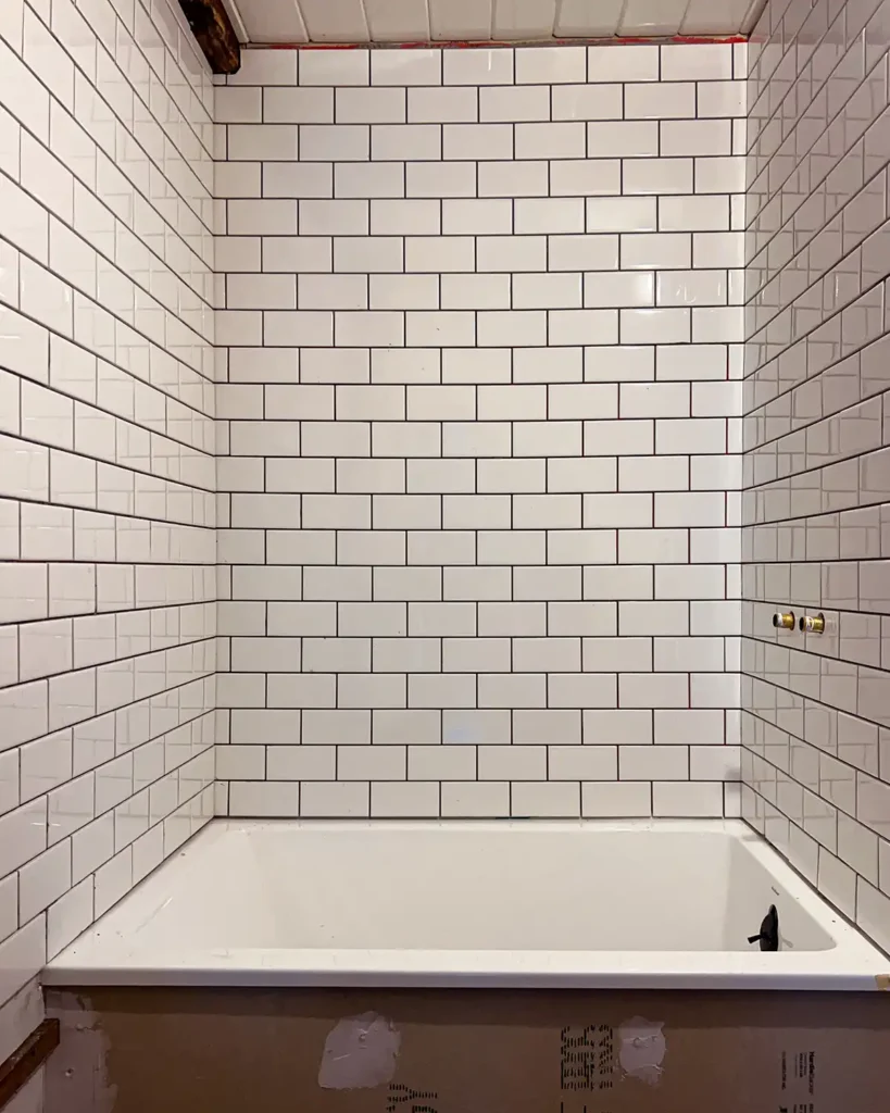 Installing a subway tile tub surround, white subway tile