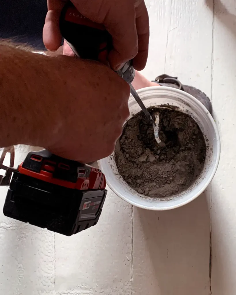 Mix small batches of thinset mortar for tiling with a drill