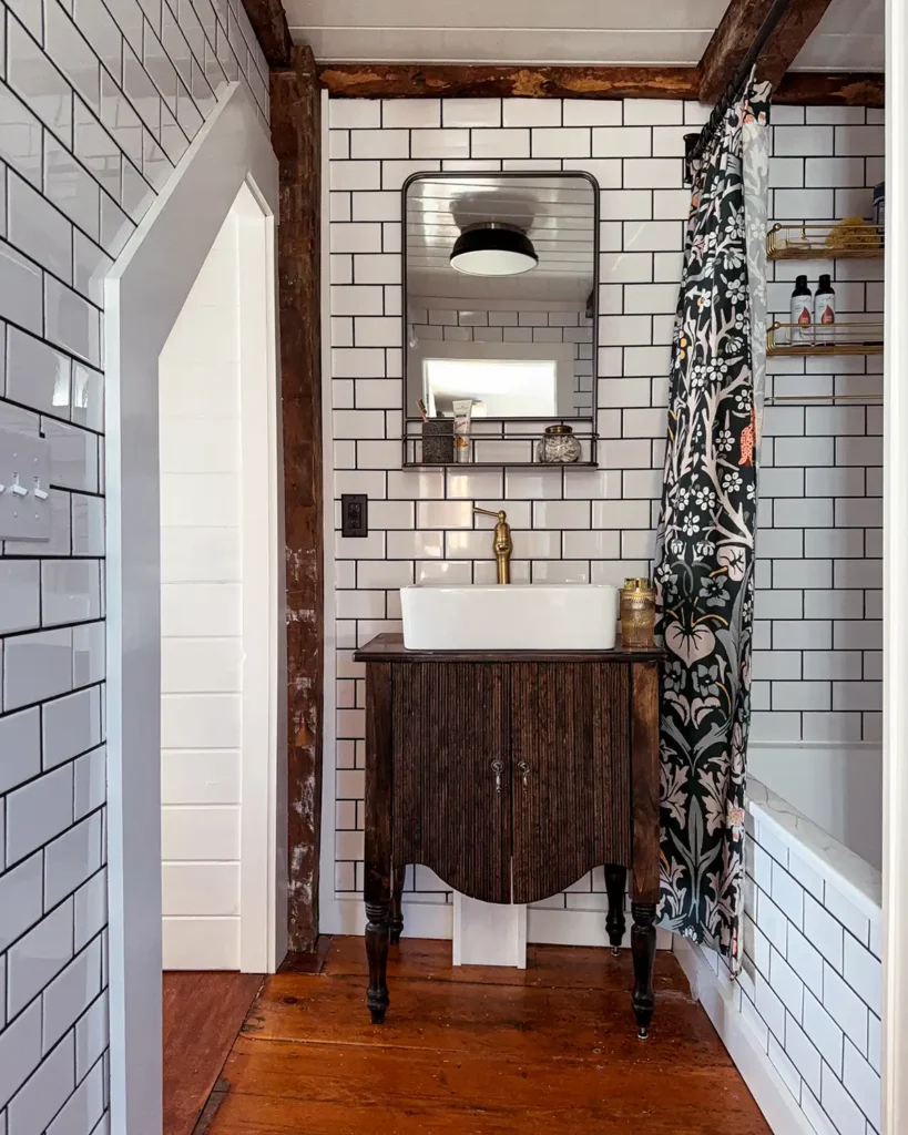 DIY bathroom vanity with reeded front doors and stained dark, built to look like the Arhaus Conrad line of furniture