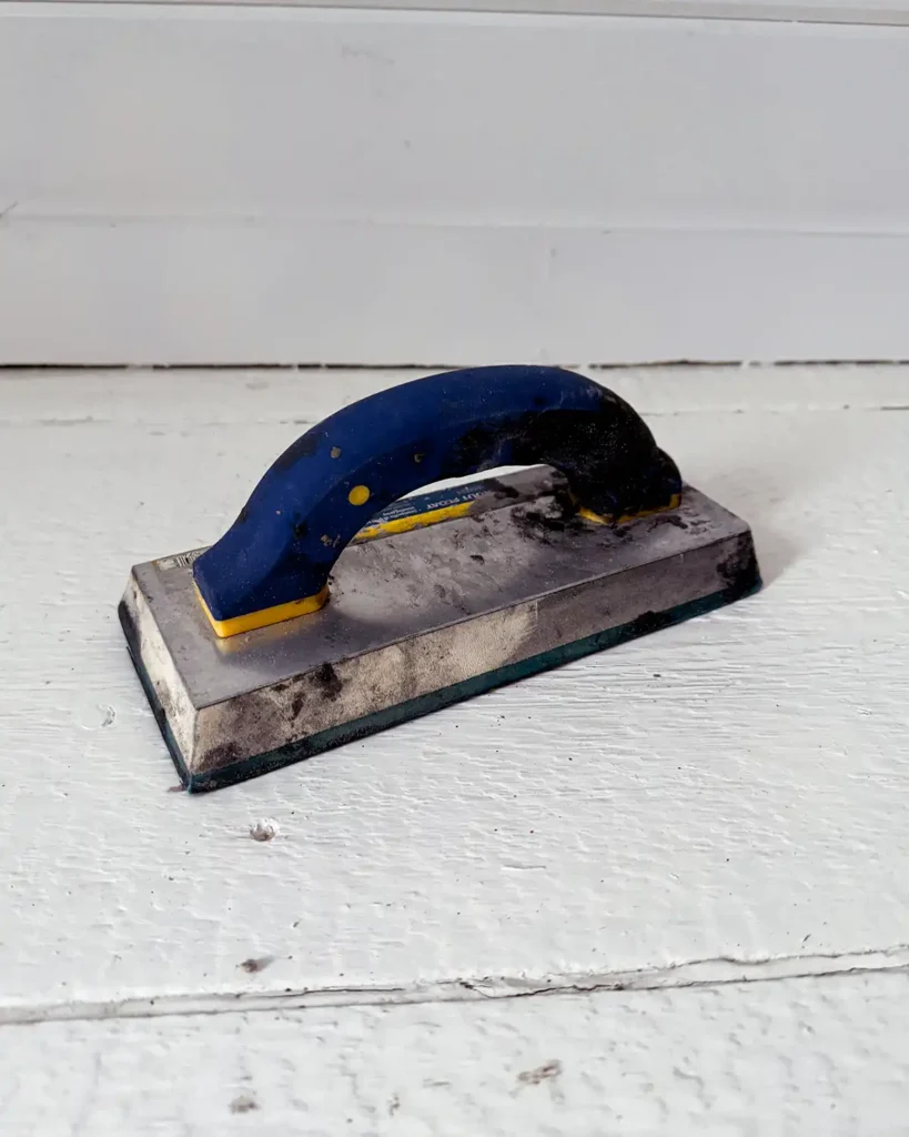 Rubber grout float, one of the essential tools used for how to grout tile