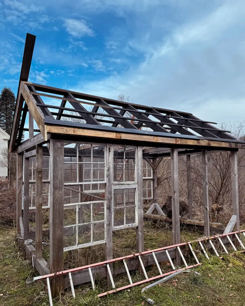 Using old windows for greenhouse sides, starting to install window sash in greenhouse frame