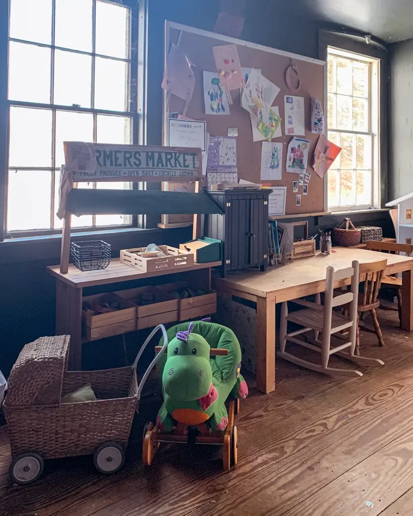 Playroom before starting to renovate it looking at the art desk and farmer's market area