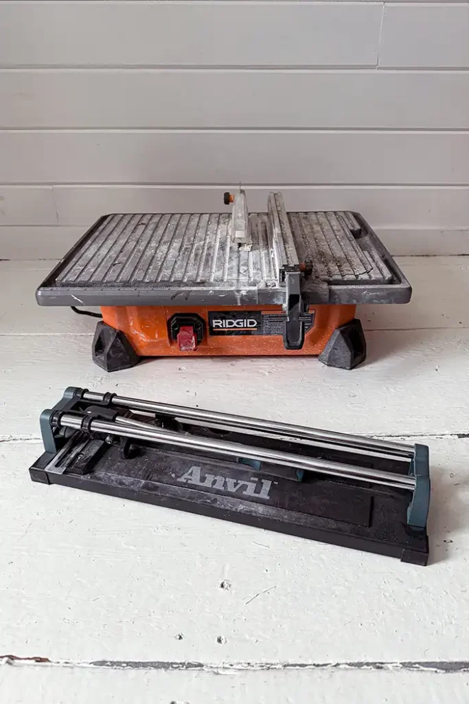 Tools for tilers featured image with a wet saw and manual tile cutter