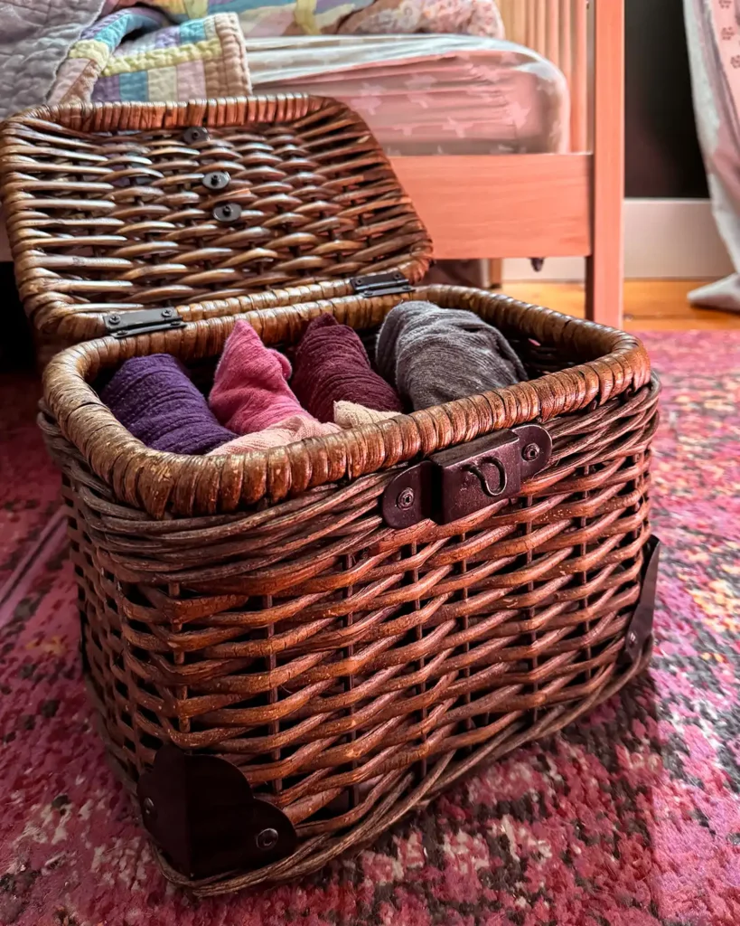 Basket of kids tights in a nursery