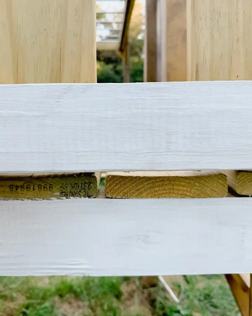 Testing primer on pressure treated wood before painting the entire project