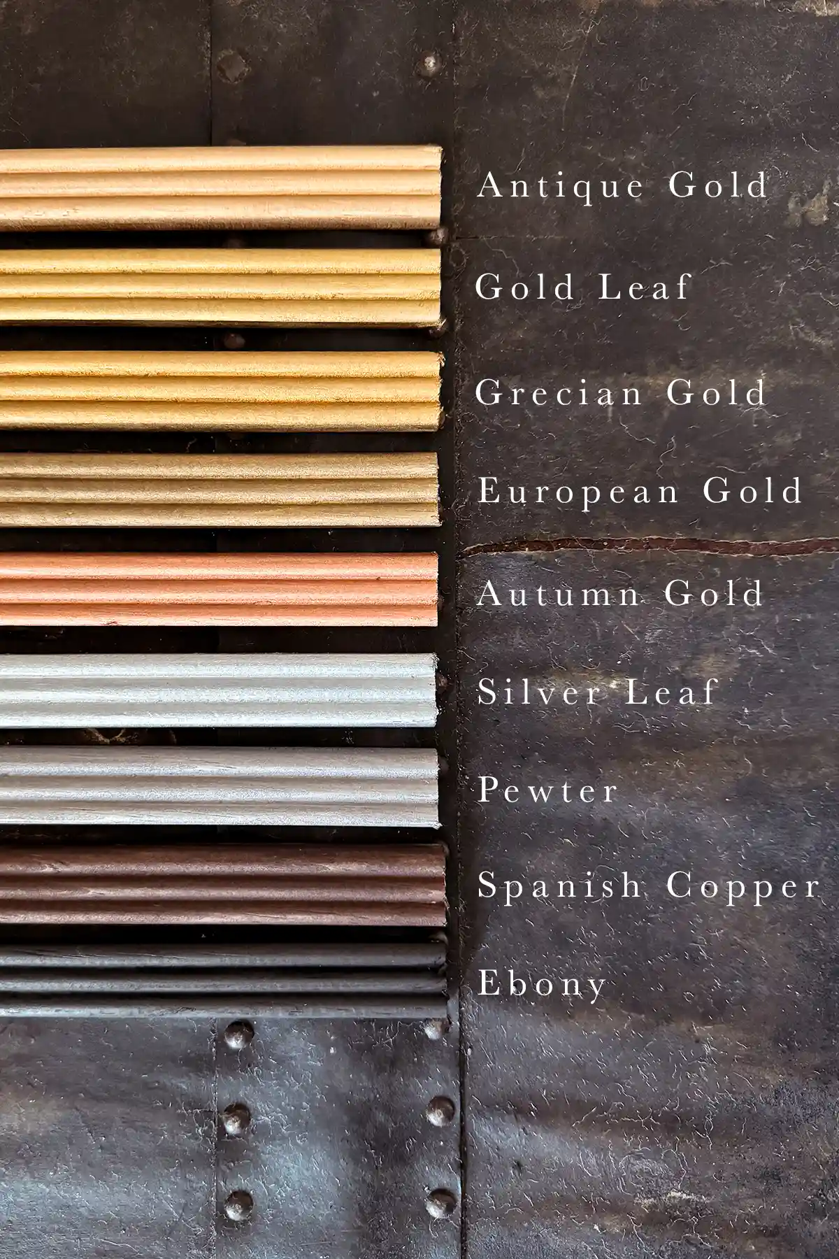 Using wood trim pieces, one for each Rub N Buff color, to create a color comparison chart of all nine Rub N Buff colors