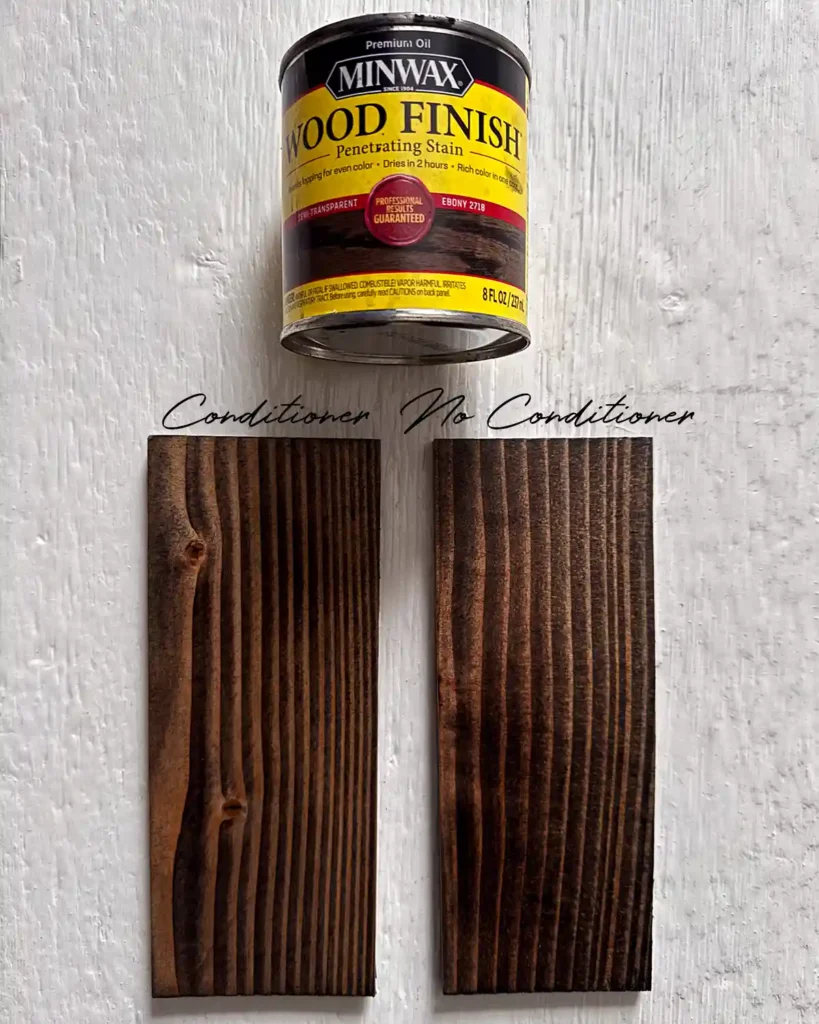 A sample size jar of Minwax Ebony stain on two douglas fir wood samples; the sample on the left has wood conditioner under the stain and the sample on the right does not