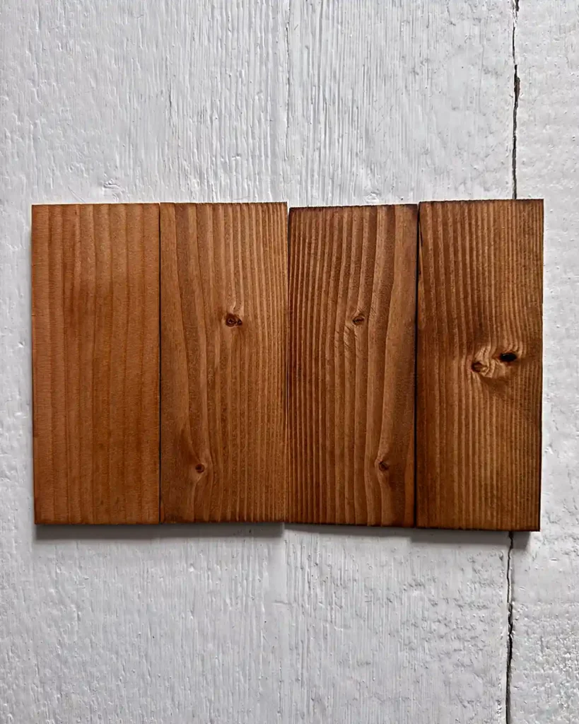 The four lightest of the dark Minwax stains on douglas fir wood samples