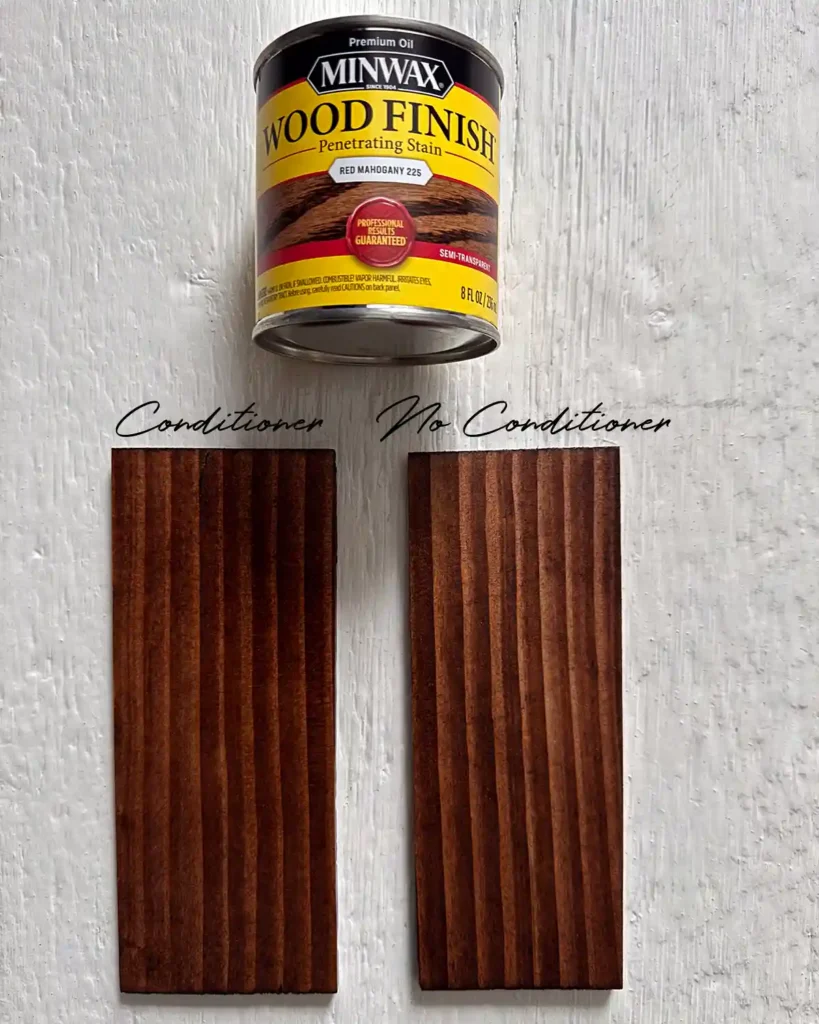 A sample size jar of Minwax Red Mahogany stain on two douglas fir wood samples; the sample on the left has wood conditioner under the stain and the sample on the right does not