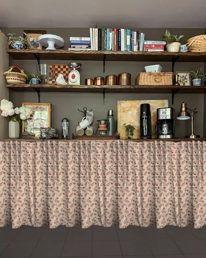 Charcoal gray painted kitchen floor with pink floral curtains Photoshopped to hang over lower pantry shelves with open shelves above