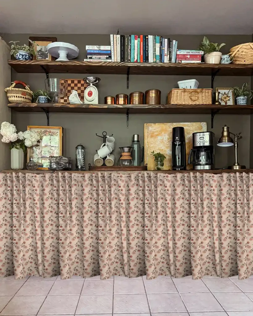 Pink earthy florals patterned cafe curtains Photoshopped onto lower kitchen pantry shelves to conceal the bottom shelves with open, styled storage shelves hanging above