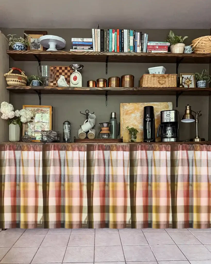Pantry shelves with the Anthropologie woven multi-plaid cafe curtains Photoshopped on top of them; curtains are red, orange, yellow plaid pattern