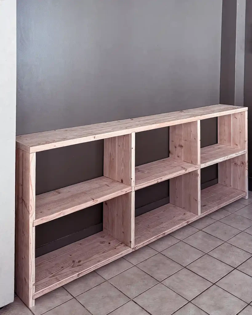 A DIY unfinished wood bookshelf built out of fir framing lumber
