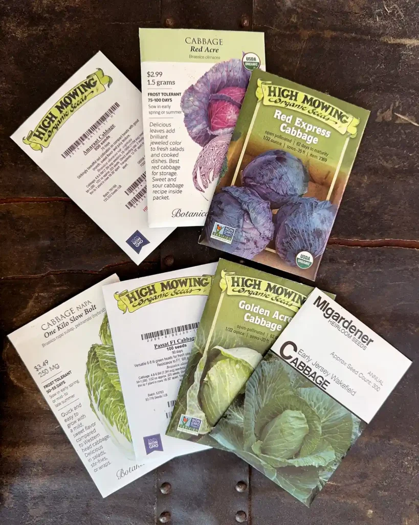 Cabbage seed packets for the 2026 planting season featuring Amarant Cabbage, Red Acre Cabbage, Red Express, Green Cabbage, Early Jersey Wakefield Cabbage, Golden Acre Cabbage, Napa One Kilo Slow Bolt, and Passat Cabbage