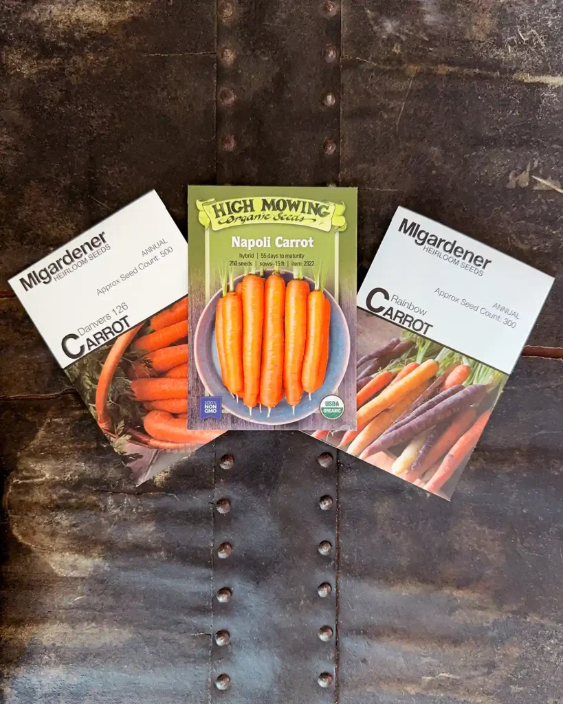 Carrot seed packets for the 2026 planting season featuring Danvers 126 Carrot, Napoli Carrot, and Rainbow Blend