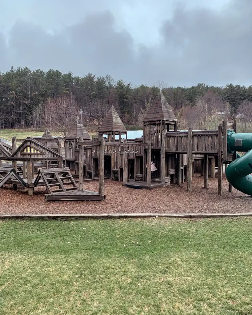 A large wooden playground at Elizabeth Park in Vermont