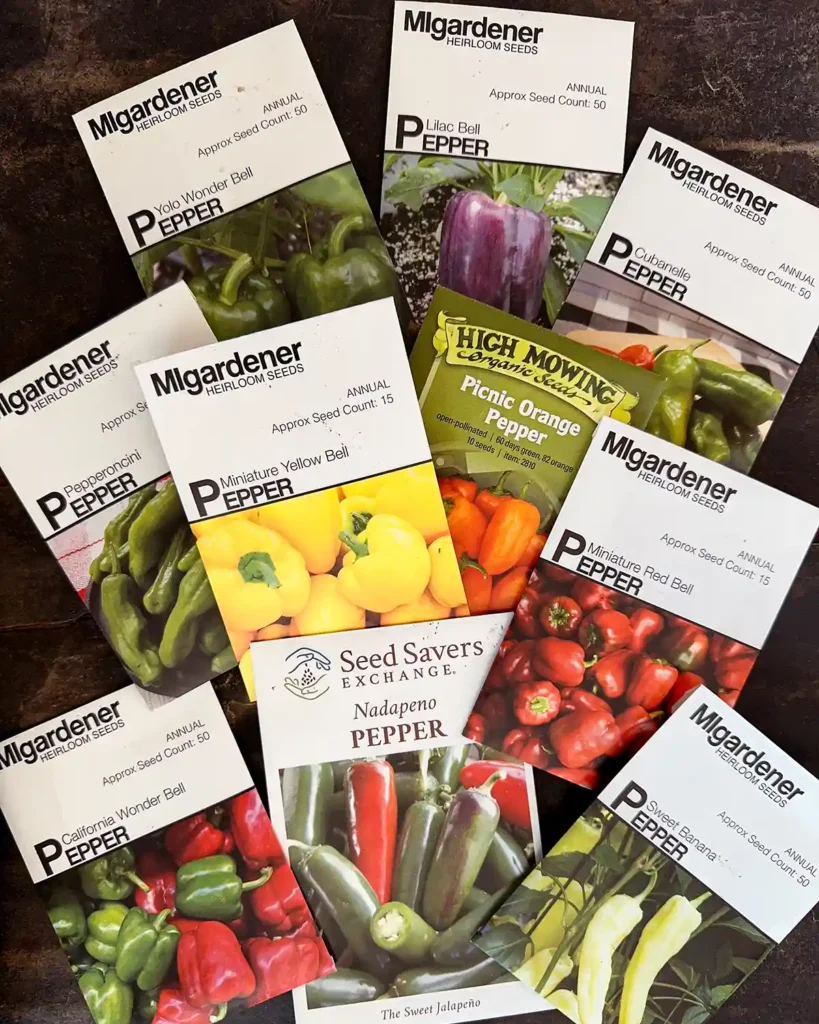 Mild Pepper seed packets for the 2026 planting season featuring Banana Pepper, California Wonder Bell Pepper, Cubanelle, Lilac Bell, Miniature Red Bell Pepper, Miniature Yellow Bell Pepper, Nadapeno Pepper, Pepperoncini Pepper, Picnic Orange Pepper, and Yolo Wonder