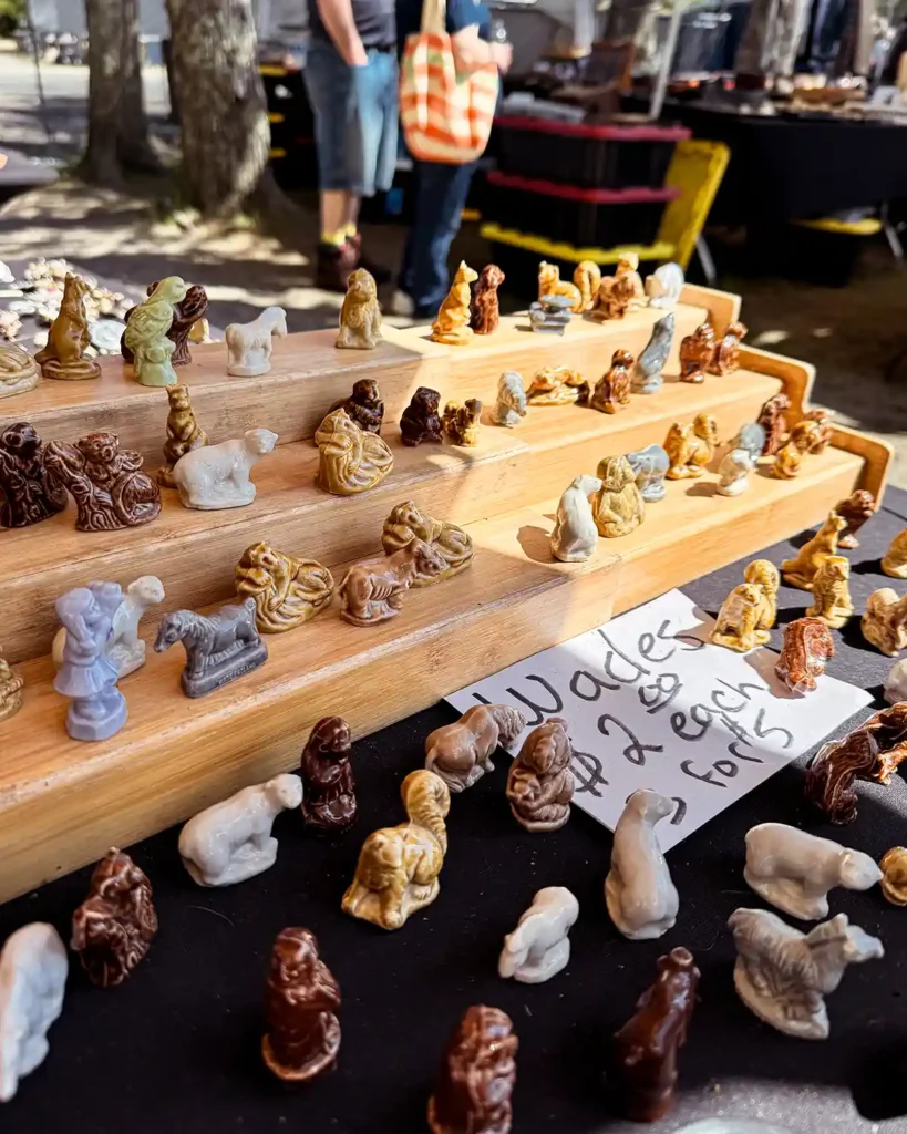 A collection of Wades figurines for sale at the Brimfield flea market for $2 each